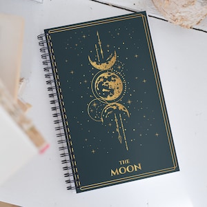 The Moon Tarot Card Journal with a Witchy Aesthetic Gold and Blue Tarot Blank Spiral Notebook