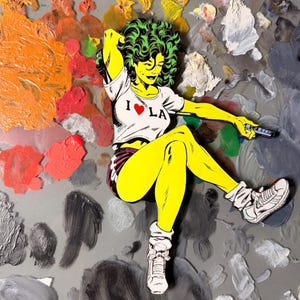 May include: A yellow-skinned character with curly green hair wearing a white cropped t-shirt with the text I heart LA and dark shorts. The character is depicted in a dynamic pose, wearing white sneakers and socks, set against a background of paint.