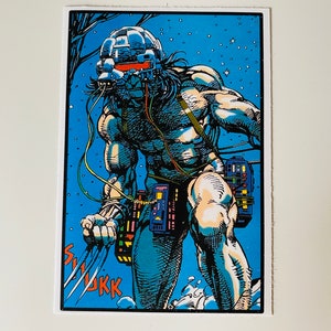 May include: A blue and white comic book illustration of a character wearing a helmet and a harness with a futuristic design. The character is holding a weapon and has a determined expression on their face.