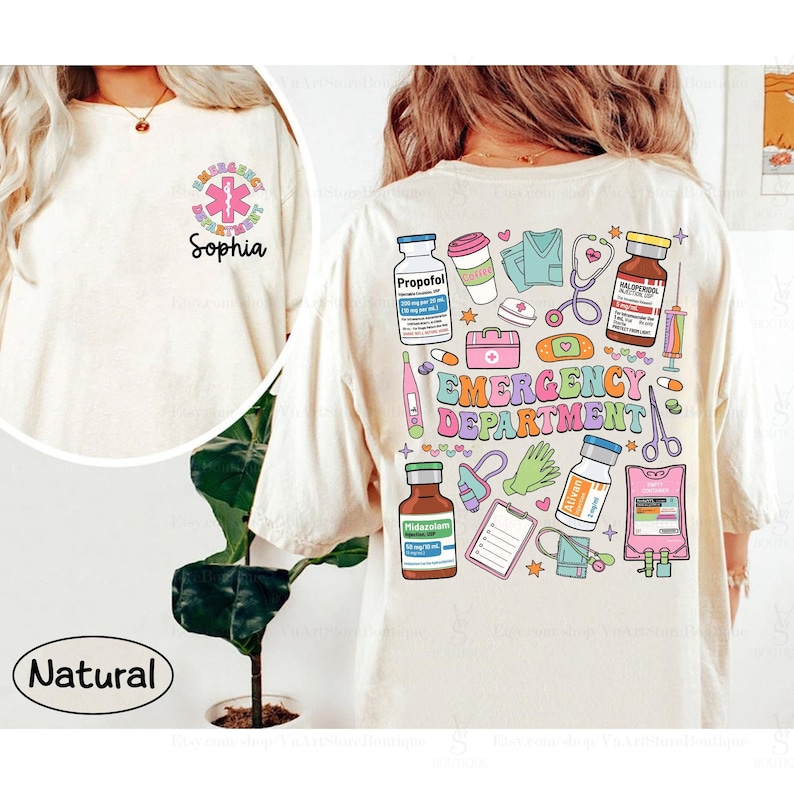 May include: A natural colored t-shirt with a graphic print of medical supplies and the text "Emergency Department".