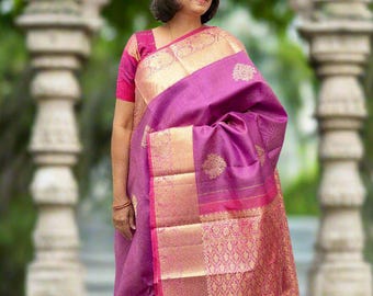 Purple Kanjivaram saree with pink border