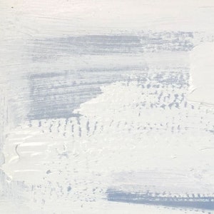 May include: Abstract painting with white and light blue paint strokes. The paint is applied in a thick, textured layer, creating a sense of depth and movement.