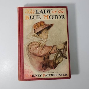 The Lady of the Blue Motor by G. Sidney Paternoster. Hardcover Book Published by Grosset & Dunlap, 1907.