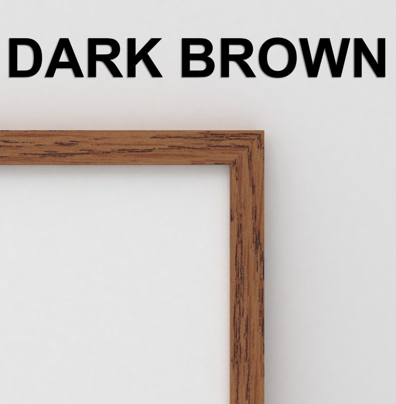 May include: A close-up of the corner of a dark brown wood picture frame.