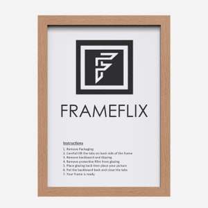 May include: A light wood picture frame with instructions on how to assemble it. The instructions include removing packaging, lifting tabs, removing the backboard and glazing, removing protective film, placing the picture, putting the backboard back, and closing the tabs. The frame is ready to display your artwork.