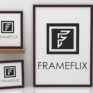 May include: Three brown picture frames with white mounts and black text. The largest frame has a stylised black and white letter F and the text "FRAMEFLIX". The two smaller frames have the same design but are smaller.