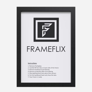 May include: Black picture frame with instructions on how to assemble the frame. The instructions include: Remove Packaging, Carefully lift the tabs on back side of the frame, Remove backboard and Glazing, Remove protective film from glazing, Place glazing back then place your picture, Put the backboard back and close the tabs, Your frame is ready.