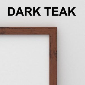 May include: A close-up of the top right corner of a dark brown wood picture frame. The frame is against a white wall. The text "DARK TEAK" is printed in black at the top of the image.