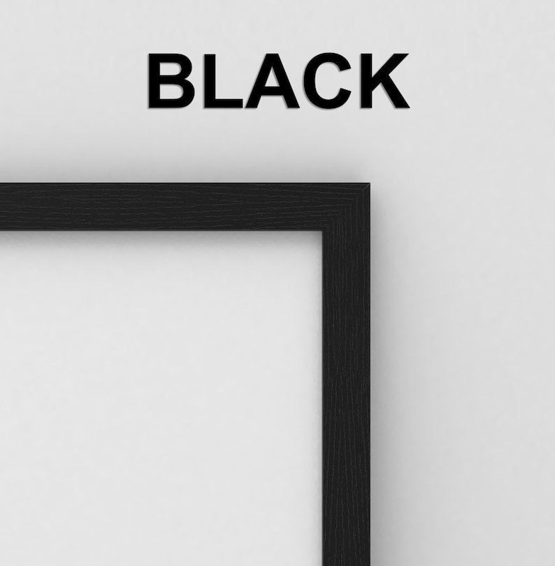 May include: Close-up of the top right corner of a black picture frame. The frame is made of wood and has a smooth finish.