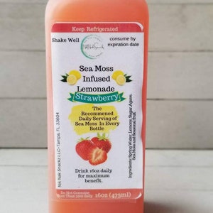 May include: A 473ml bottle of strawberry sea moss infused lemonade. The label reads "Sea Moss Infused Lemonade Strawberry" and includes the recommended daily serving of sea moss in every bottle.  Drink 473ml daily for maximum benefit. Do not consume more than once daily. Keep refrigerated. Shake well. Consume by expiration date.