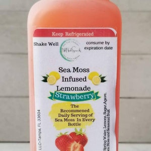 May include: A pink plastic bottle of Sea Moss Infused Lemonade with Strawberry flavor. The bottle is labeled with the recommended daily serving of sea moss in every 16oz bottle. The label also states to drink 16oz daily for maximum benefit.