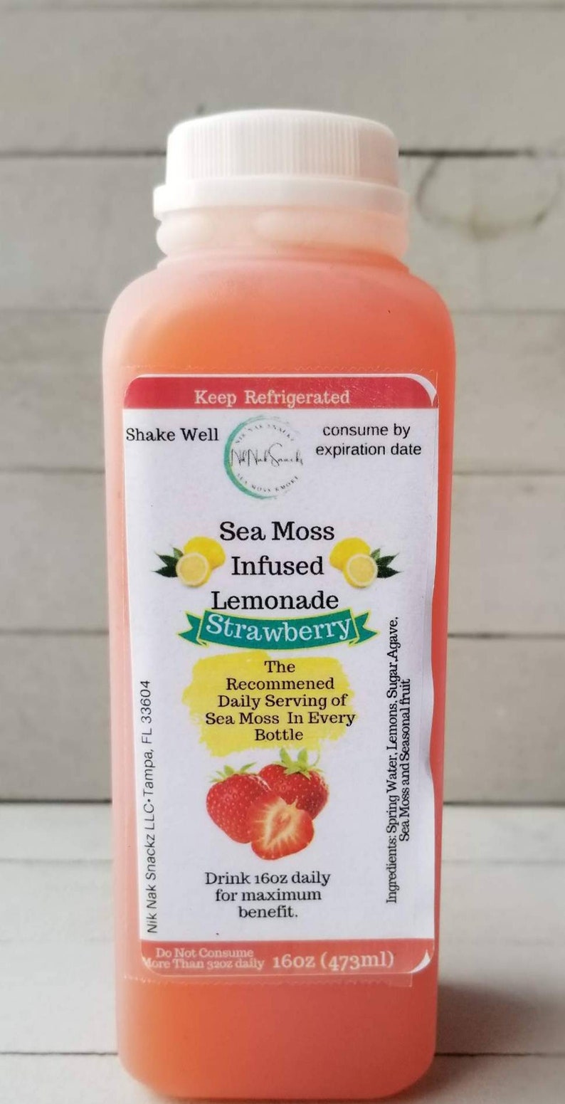 May include: A pink plastic bottle of Sea Moss Infused Lemonade with Strawberry flavor. The bottle is labeled with the recommended daily serving of sea moss in every 16oz bottle. The label also states to drink 16oz daily for maximum benefit.