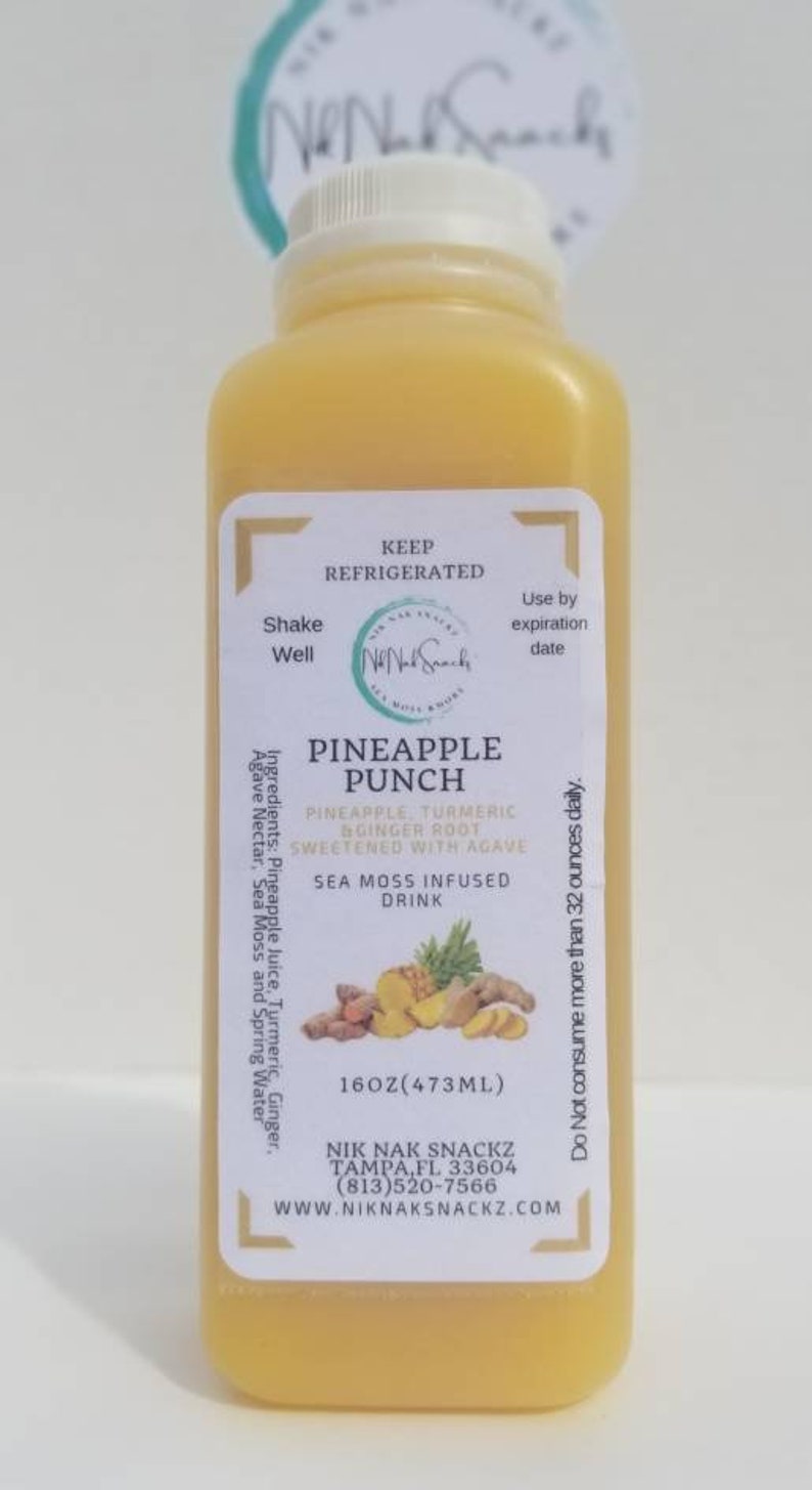 May include: A 473ml bottle of pineapple punch juice with a yellow label. The label reads "Pineapple Punch", "Pineapple, Turmeric, Ginger Root, Sweetened with Agave", "Sea Moss Infused Drink", "Nik Nak Snackz, Tampa, FL 33604, (813) 520-7566, www.niknaksnackz.com".