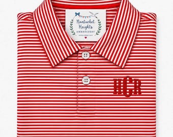 May include: A red and white horizontally striped polo shirt with a collar and two white buttons. The shirt features a red embroidered monogram with the letters HCR on the right side and a white tag reading Nantucket Heights Embroidery.