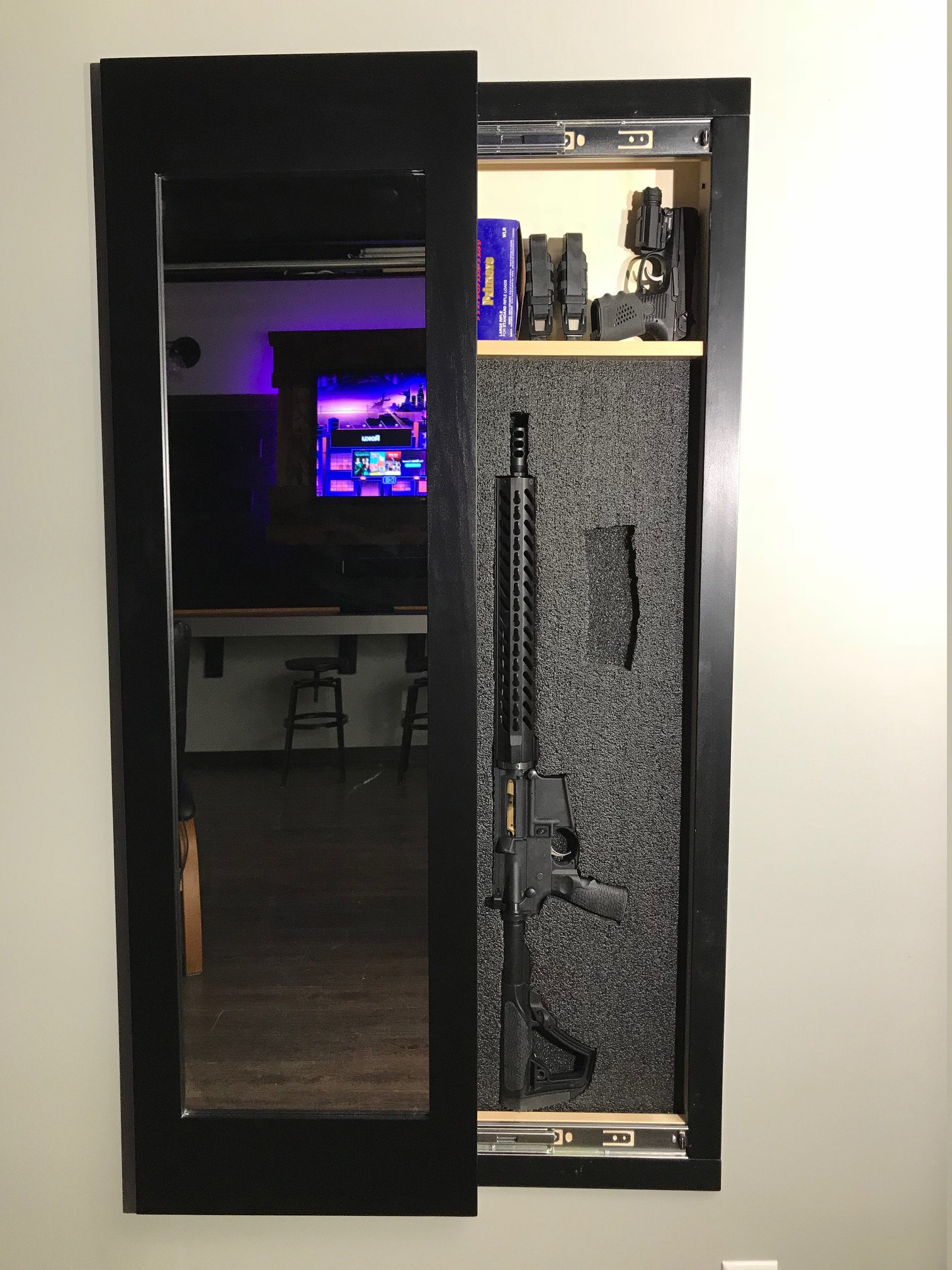 Hidden wall gun sale safe