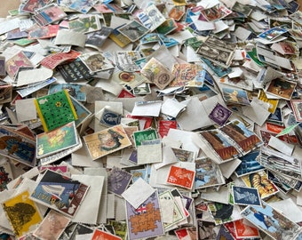 GB stamp collection of 10,000+ vintage stamps off paper.