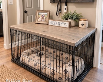 May include: A black wire dog crate with a rectangular wooden top in a willow gray finish. Inside the crate is a beige pet bed with a dark gray paw print pattern. A wooden sign on top reads FOREVER IN MY HEART with a heart symbol.