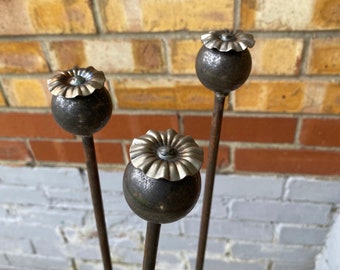 Rustic poppy seed head posts / garden ornaments/ plant posts/poppys/plant ornament