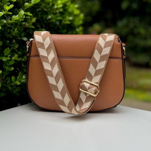 Make any purse, cell phone holder, or camera stylish with this chevron checkered aztec stripe natural cotton canvas beige tan khaki taupe sand bone cream olive army green red brown embroidered. This guitar style Boho strap purse or bag a crossbody.