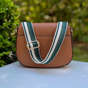 Make any purse, cell phone holder, or camera stylish with this stripe pink beige rose mauve blush black rust orange brown khaki tan sage olive army green blue aqua turquoise forest pine strap gold hardware. This guitar style Boho strap crossbody.