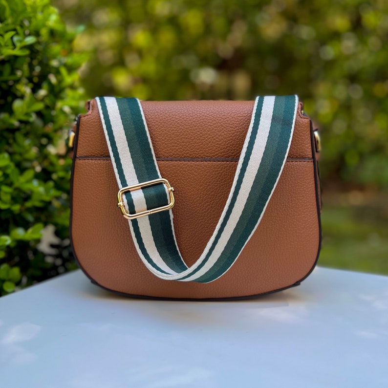 Make any purse, cell phone holder, or camera stylish with this stripe pink beige rose mauve blush black rust orange brown khaki tan sage olive army green blue aqua turquoise forest pine strap gold hardware. This guitar style Boho strap crossbody.