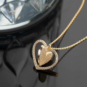 Hearts in motion necklace deals