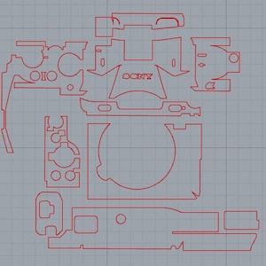 Op de afbeelding: Een rode lijntekening van een camerabehuizing met het woord "SONY" erop gedrukt. De tekening is op een grijze rasterachtergrond.