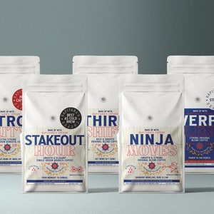 May include: Five white bags of coffee with different labels. The labels feature bold text and illustrations. The bags are arranged in a row from left to right. The labels read: "Patrol Duty", "Stakeout Hour", "Third Shift", "Ninja Moves", and "Verpa Blend".