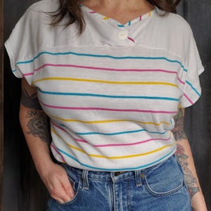 Vintage 70's-80's cropped loose fit top with banded hem and colorful stripes!