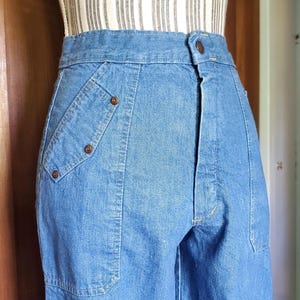 Vintage 70s rivet pocket design mid rise denim flares, bellbottom jeans.