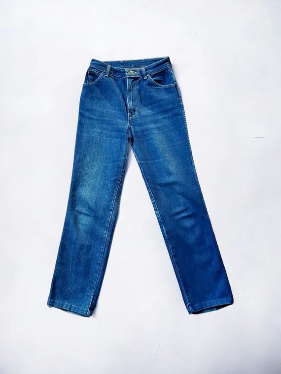 Vintage 1980's Dark wash wranglers with a little s