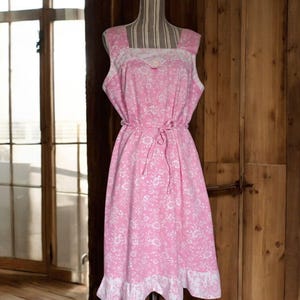 Vintage 50s Cotton handmade floral pink and white ruffle hem dress.