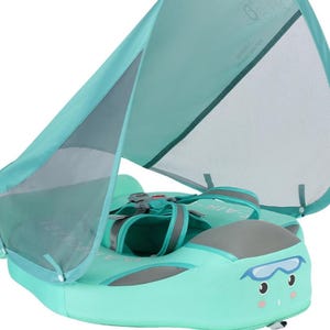May include: A teal baby float with a sunshade. The float features a cartoon face design and adjustable straps. The sunshade, supported by a frame, offers protection from the sun. The float is designed for water safety.