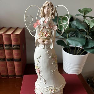 Resin Angel Figurine with Metal Wings | White Dress Angel Holding Flowers | 10.5” Decorative Angel Statue