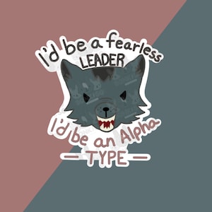 May include: A sticker with a cartoon wolf with a fierce expression. The wolf is gray with a white outline. The sticker says "I'd be a fearless leader - I'd be an Alpha type - "