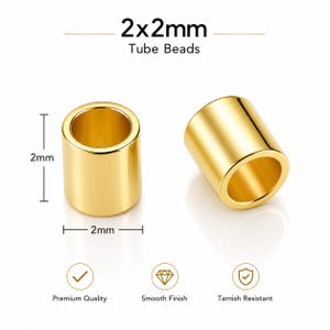 May include: Two gold-colored tube beads with a smooth, reflective finish. The text 2x2mm Tube Beads is displayed at the top. Dimension lines indicate a height and width of 2mm. Three circular icons below feature checkmarks and a diamond symbol.