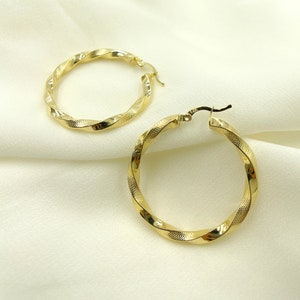 14K Solid Hollow Gold Twisted Hoops 38mm with Texture. Yellow gold Round twisted earrings. Solid Gold hoops for her. Weight: 5.13g. GER129