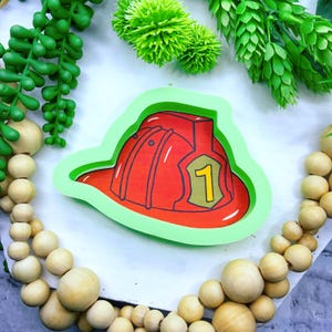 Koekjesuitsteker voor brandweerhelm