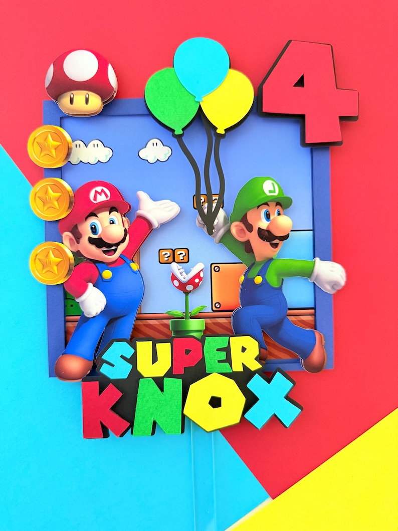May include: A colorful cake topper featuring Mario and Luigi characters, gold coins, a mushroom, and balloons. The number 4 is displayed, along with the text "SUPER KNOX". The background is a mix of red, blue, and yellow.