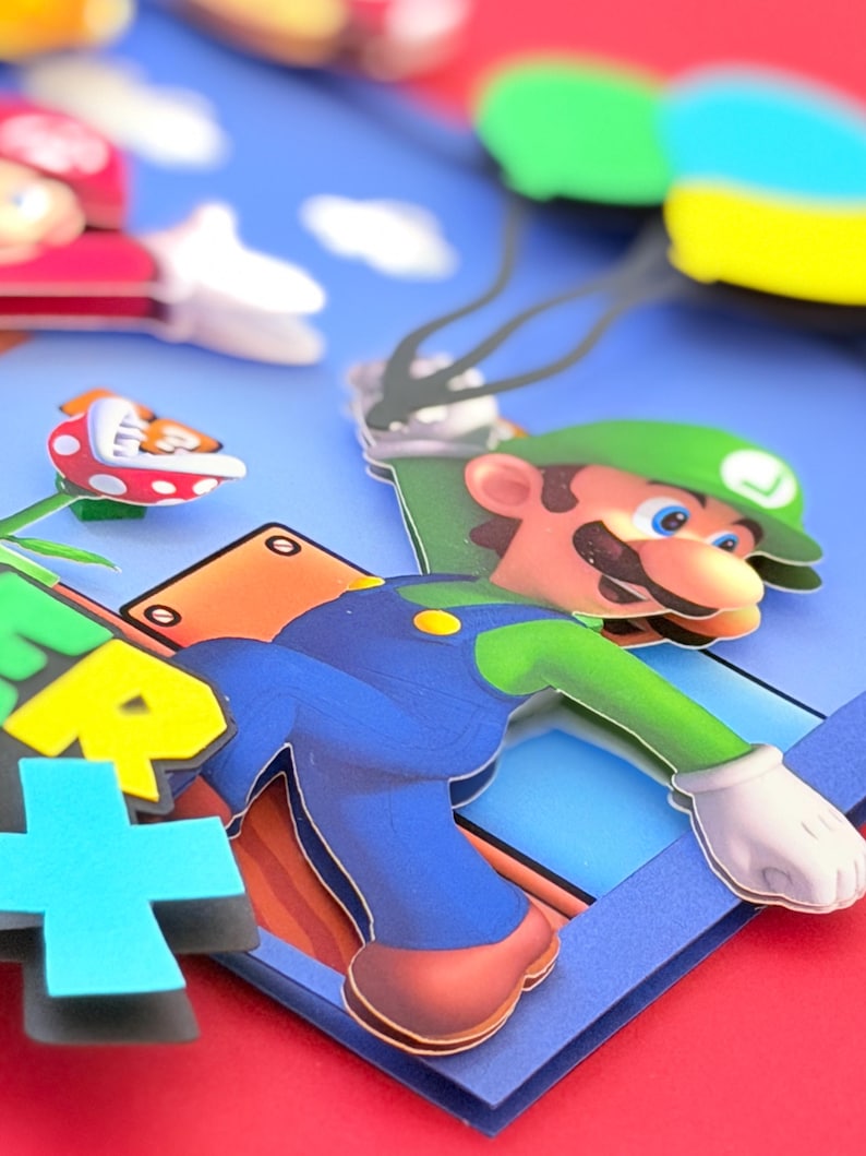May include: A colorful, layered papercraft featuring the character Luigi from the Super Mario Bros. video game series. Luigi is depicted in his signature green hat and blue overalls, with a blue sky and other game elements.