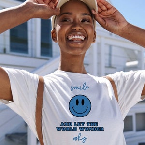 smile and let the world wonder why tee | aesthetic smiley face | women’s t-shirt
