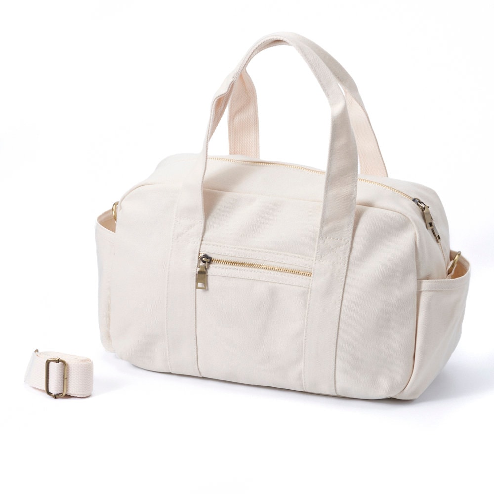 white travel shoulder bag