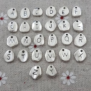 305 Pieces Dangle Nail Piercing Charms ABC Letter Set Alphabet Mini AZ  Letter Charms Alphabet Charms Initial Pendant Nail Jewelry Rings with Nail