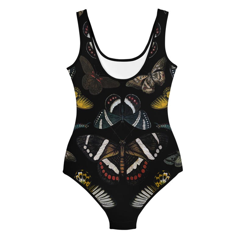 May include: Black one-piece swimsuit with a colorful butterfly print. The swimsuit has a scoop neck and a racerback style.