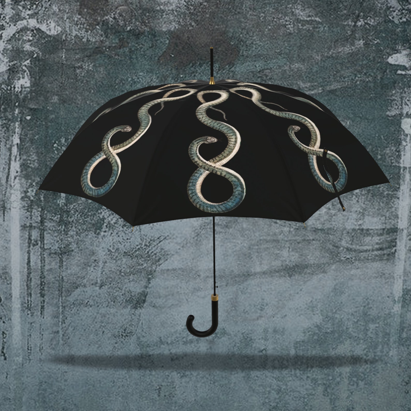 Black parasol with coiled silver serpent design, handmade in luxury antique style for gothic and alternative fashion lovers
