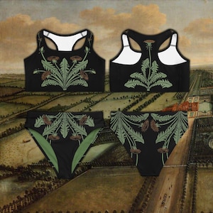 May include: Black athletic top and high-waisted bottoms set featuring a green and brown dandelion design. The top has a racerback style with white trim, and the bottoms have a high-waisted cut with green accents. The set is displayed against a landscape painting.