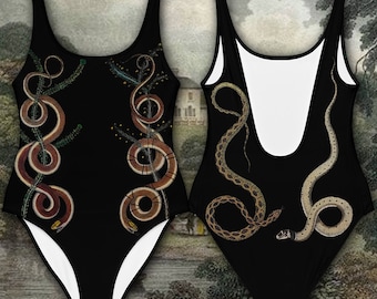 May include: Black swimsuit with a snake design. The snakes are brown and gold and are arranged in a vertical pattern on the front of the swimsuit. The back of the swimsuit is plain black.