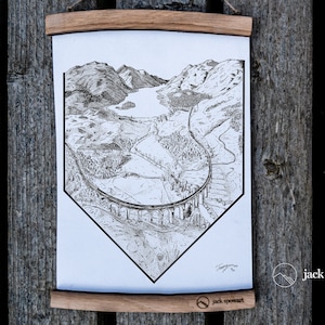 May include: Black and white line art print of a train trestle bridge over a valley with a lake. The print is framed with a wooden frame and has the text "jack spowart" at the bottom.