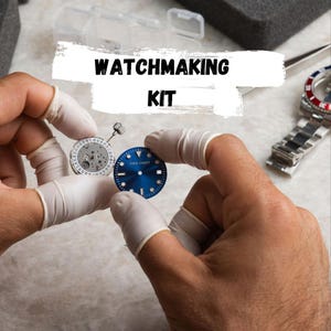 May include: A watchmaking kit with the text "WATCHMAKING KIT" in a white banner. The image shows a watch face with a blue dial and a silver watch mechanism. The kit includes watch parts and tools.