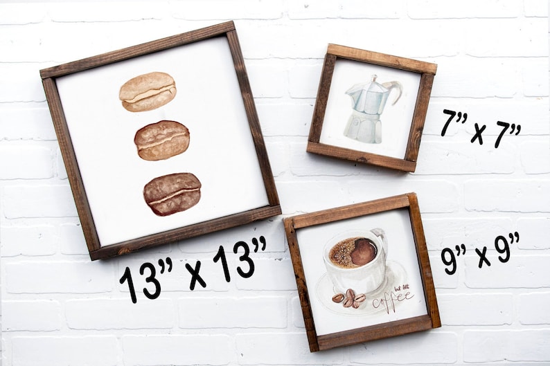 May include: Three framed wood signs with coffee-themed illustrations. The largest sign is 13 inches by 13 inches and features three coffee beans. The middle sign is 7 inches by 7 inches and features a silver coffee pot. The smallest sign is 9 inches by 9 inches and features a cup of coffee with the text "but first, coffee".